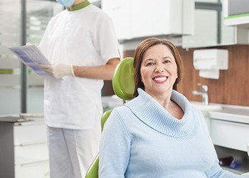 Woman at dentist for dental implants