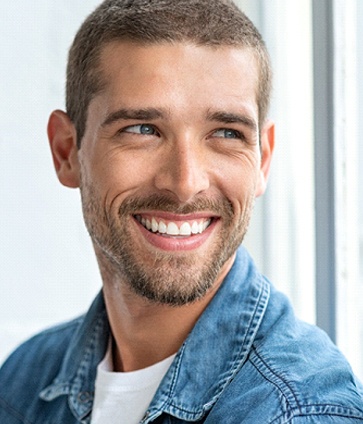 Man smiling with white, healthy teeth