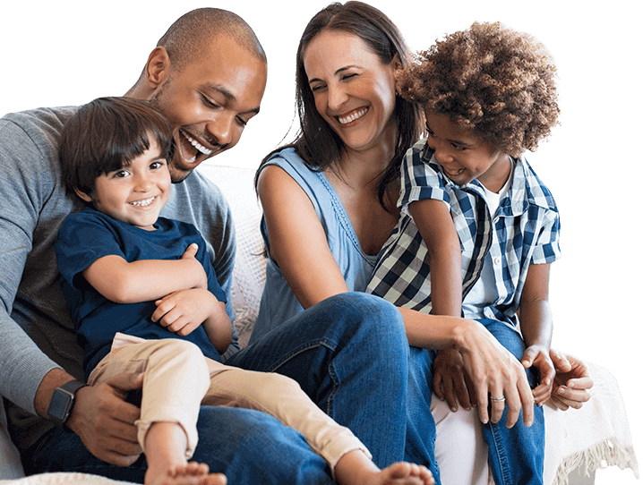 Family of four in dental office waiting room