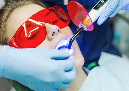 Woman receiving dental sealants