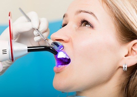 Woman receiving cosmetic dental bonding