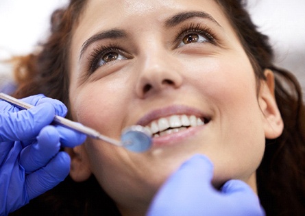 a person receiving a dental examination