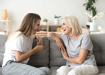 Ladies converse on couch