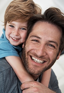 man and his son smiling