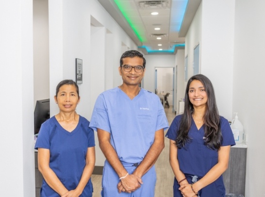 dental team smiling together