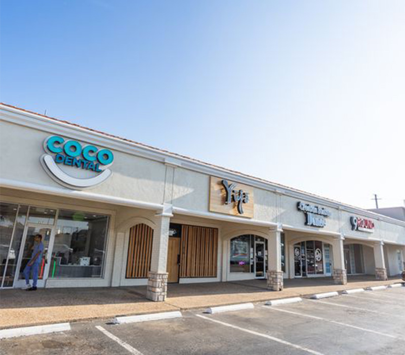 Several businesses next to Coco Dental of North Dallas