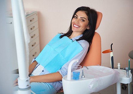 Happy patient visiting her dentist on the weekend