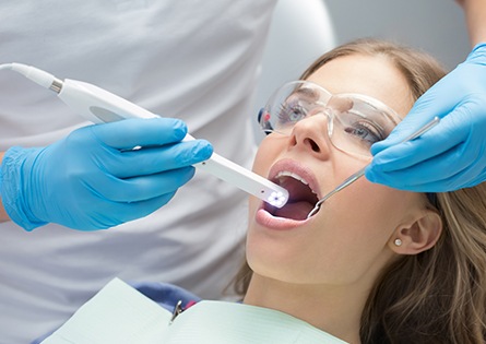 Dentist capturing intraoral images