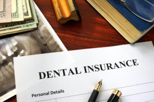 Dental insurance paperwork on a desk