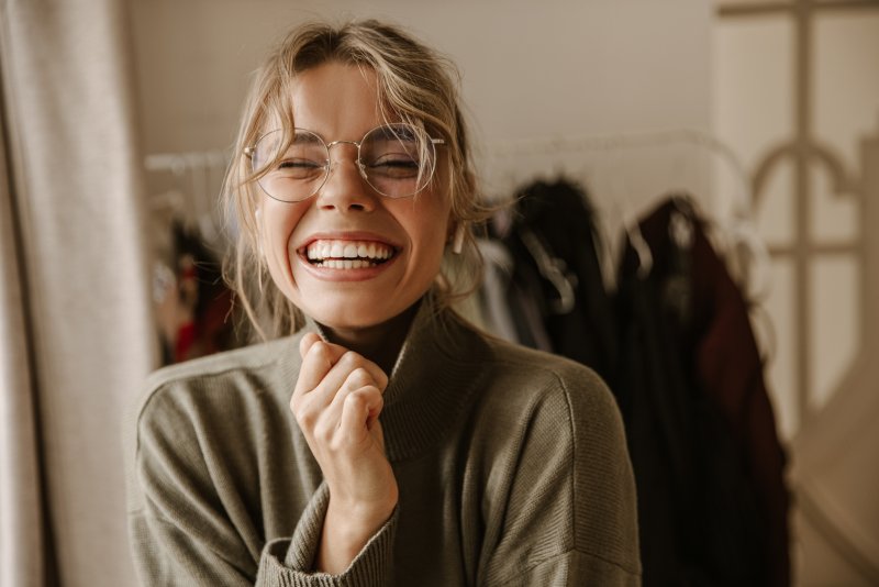 woman laughing with bright smile in Dallas