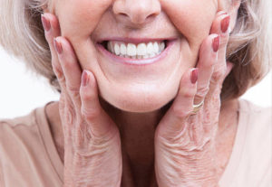 Close up with older woman with dentures