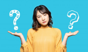 Woman shrugging with two question mark graphics hovering above her hands